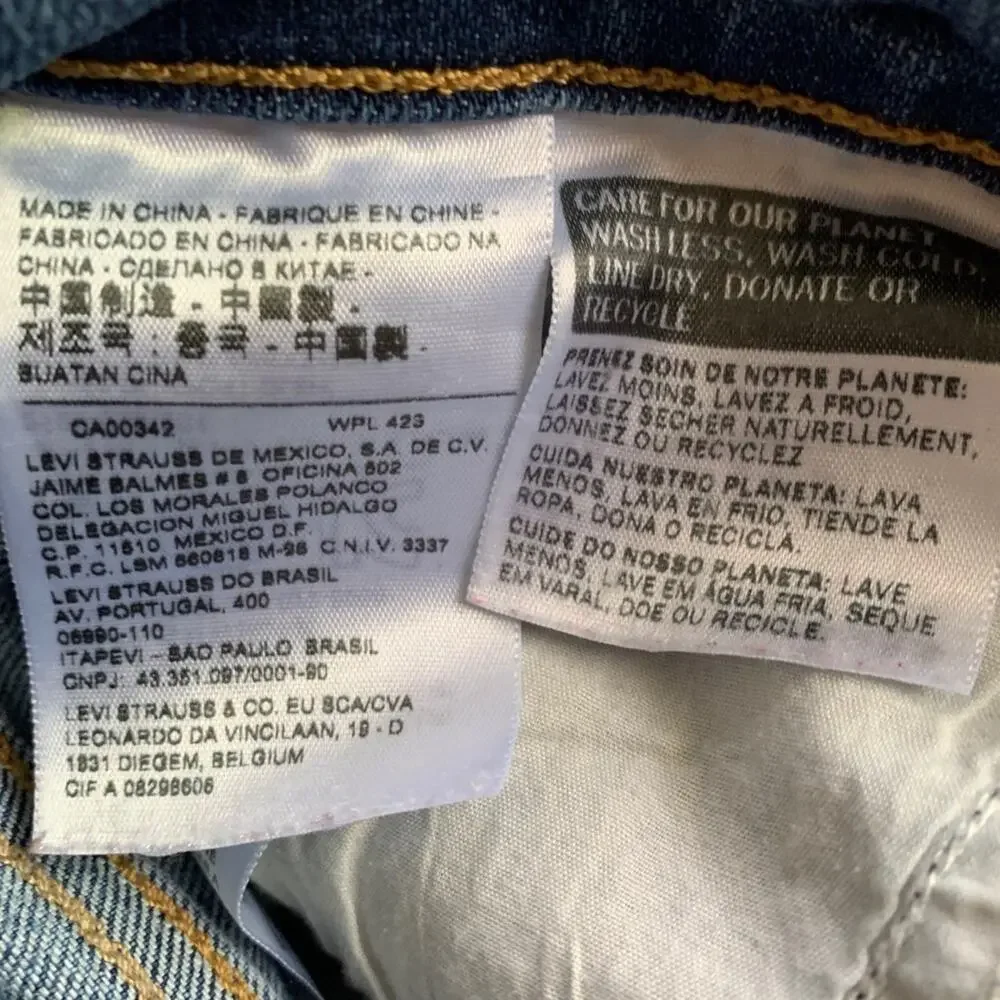 Levis rolled hem distressed jean shorts 29